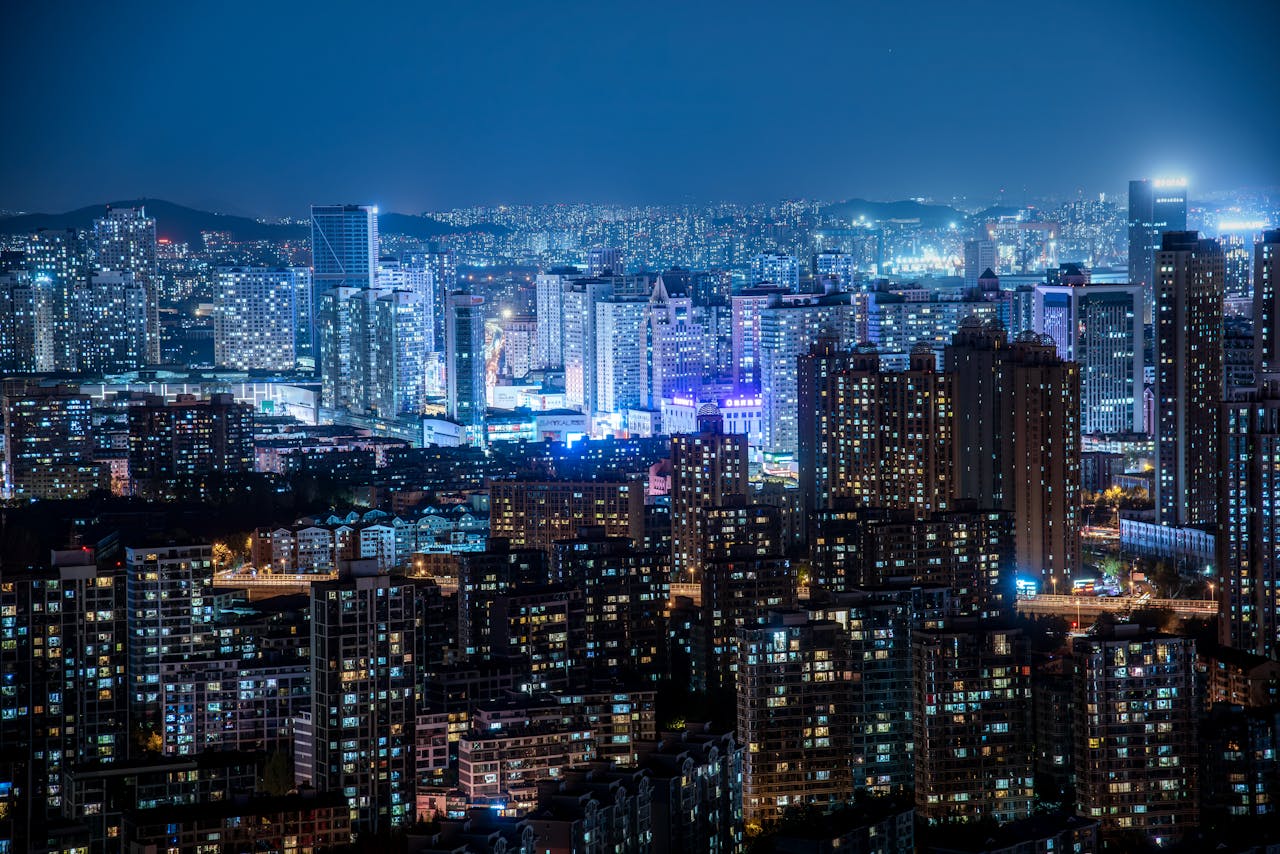 Crafting Captivating Headlines: Your awesome post title goes here A stunning cityscape at night featuring illuminated skyscrapers and modern urban architecture under a clear sky.